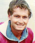 [Photo of John Greaney]